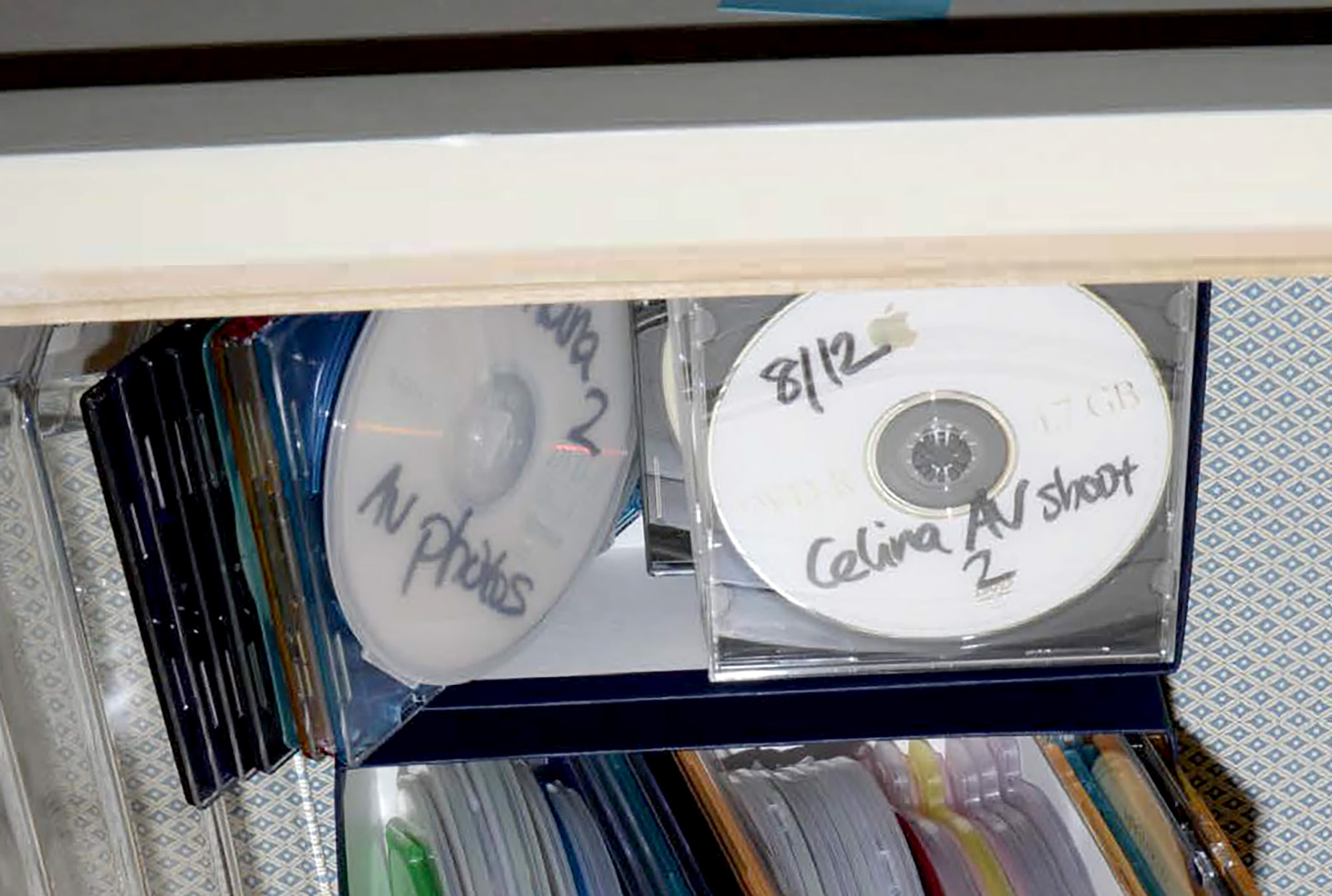 CDs Labeled with Names in Locked Safe